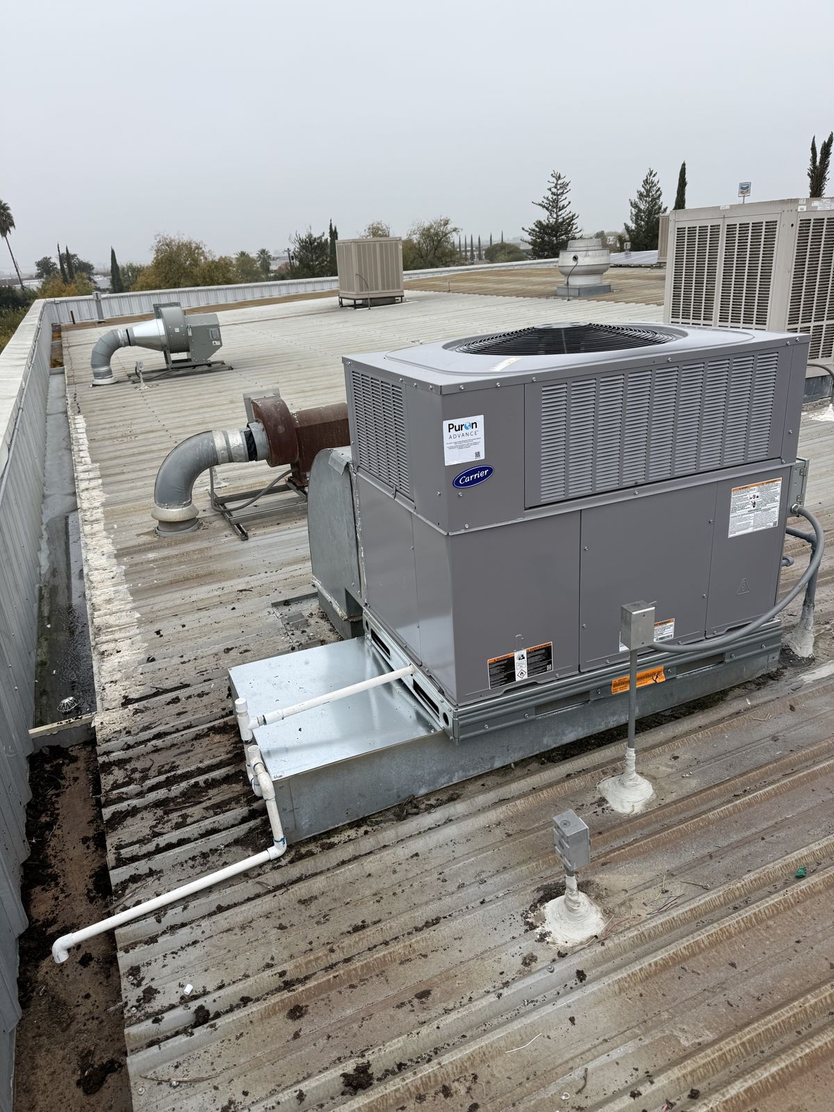 Newly installed Carrier package unit on a roof